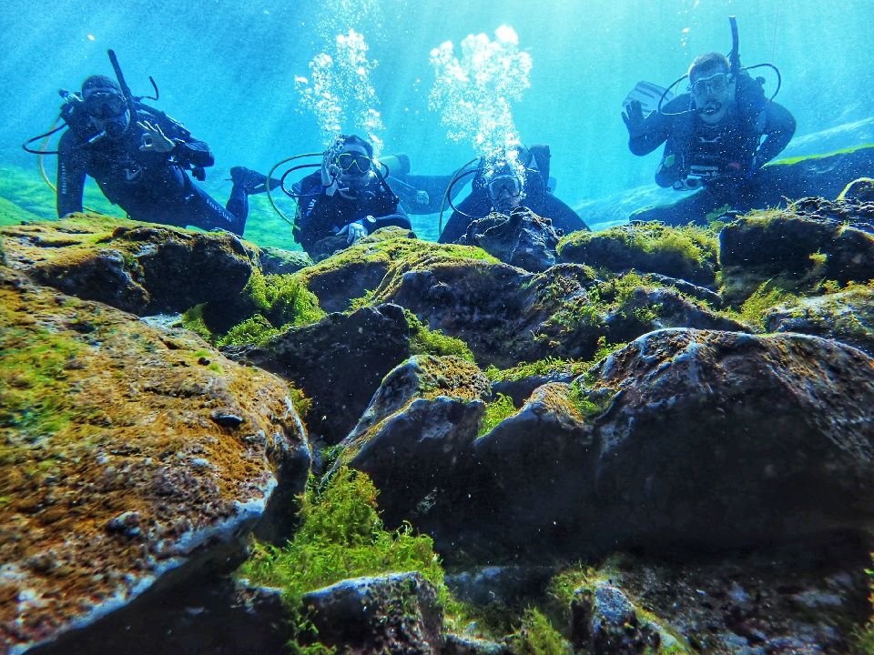 divers at cavern entrance